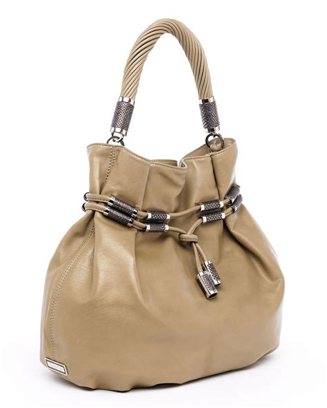 michael kors tonne drawstring shoulder bag|Michael Kors bag.